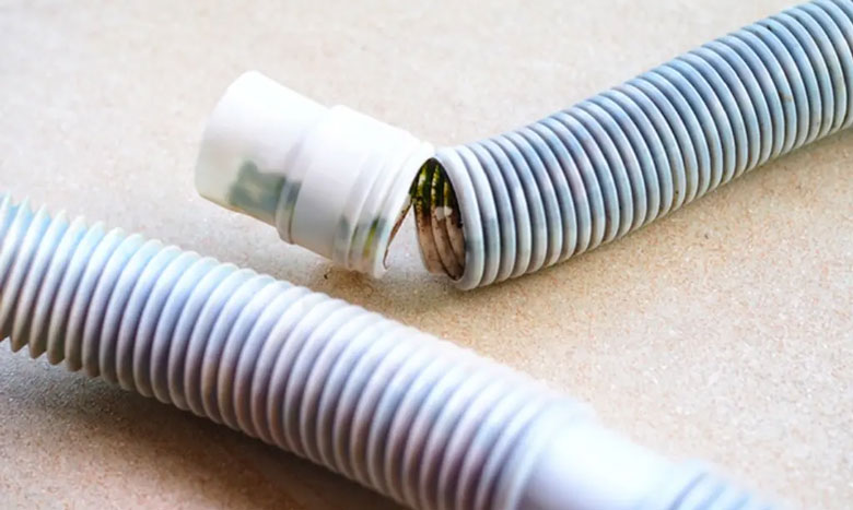 Máy giặt vắt vẫn còn nước do ống xả nước máy giặt bị tắc