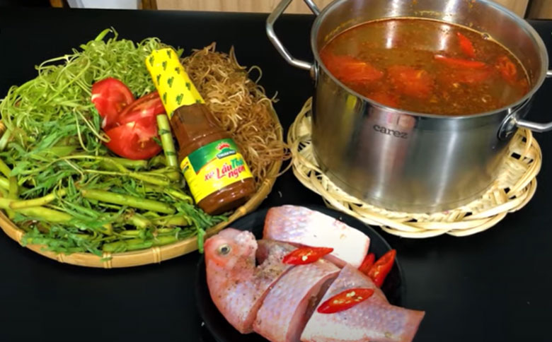 Cách nấu lẩu cá điêu hồng chua cay thưởng thức