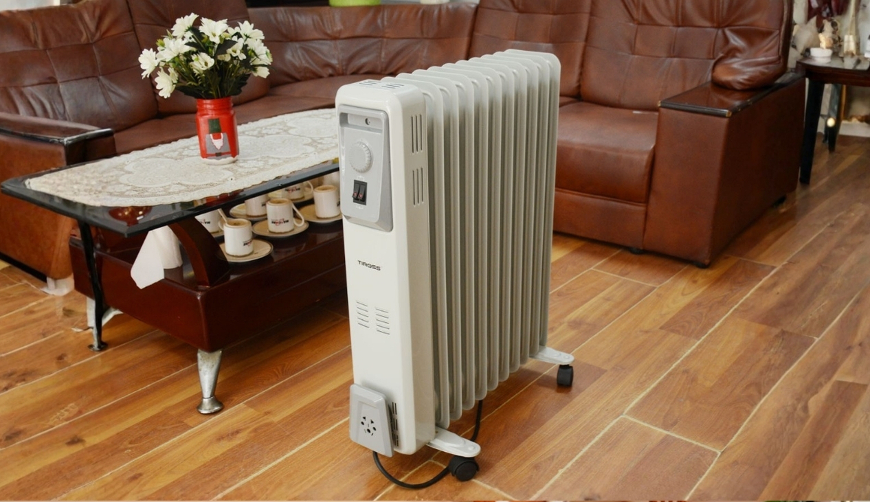 Máy sưởi dầu kêu lạch cạch - liên hệ trung tâm bảo hành